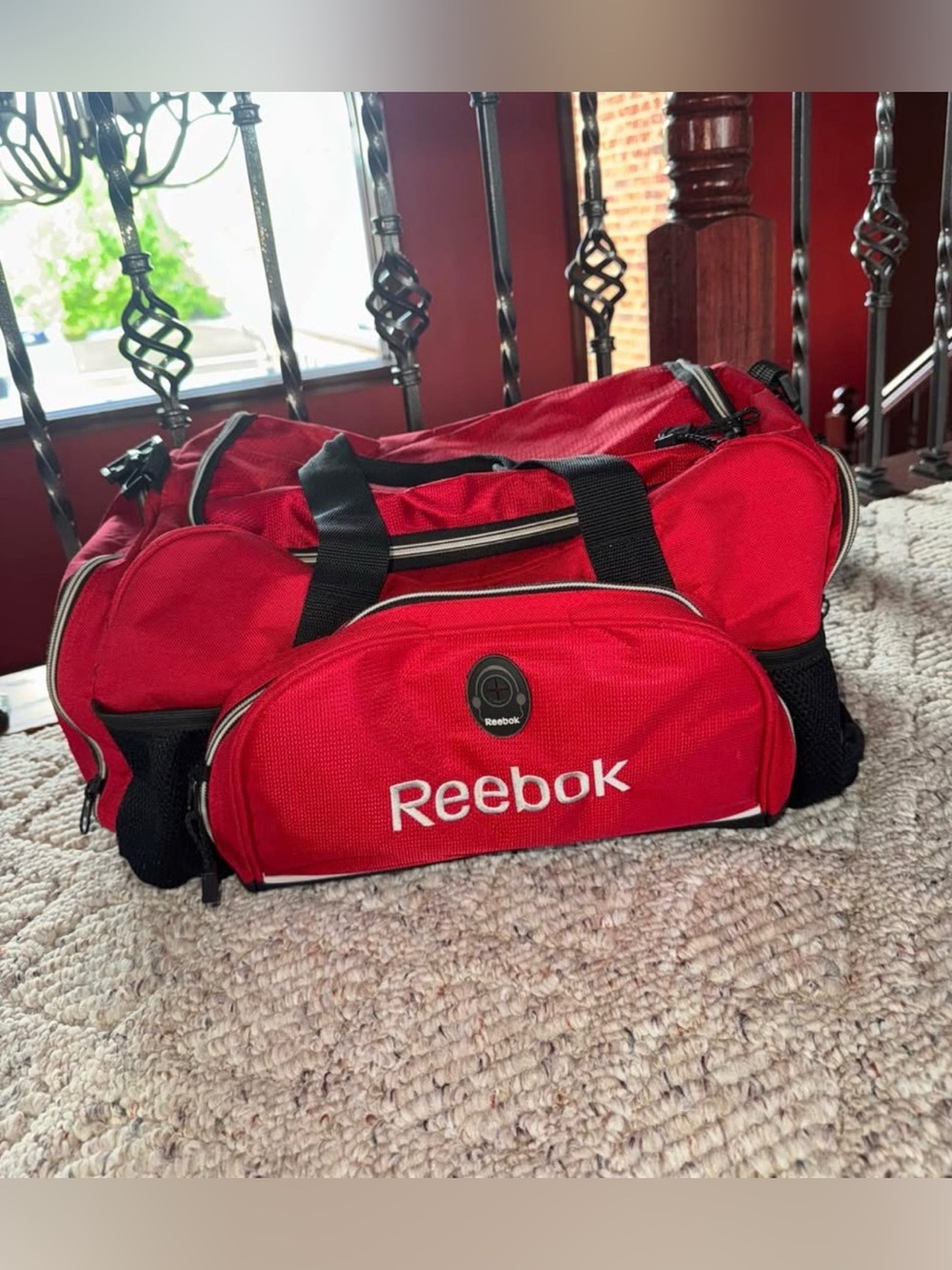 Reebok Red Men’s Duffel Bag with Multiple Pockets